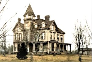 Early photo of the John C. Anderson residence. The first floor of the Anderson Mansion was built in 1883 and the second floor was added in1892.